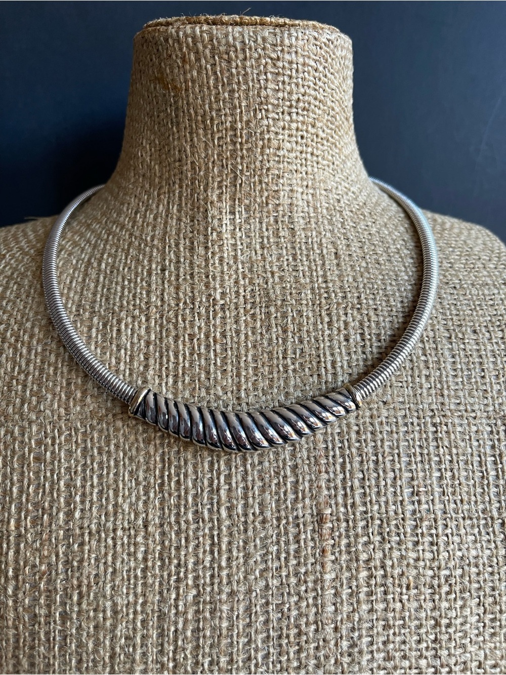 Silver and gold tone omega Necklace.